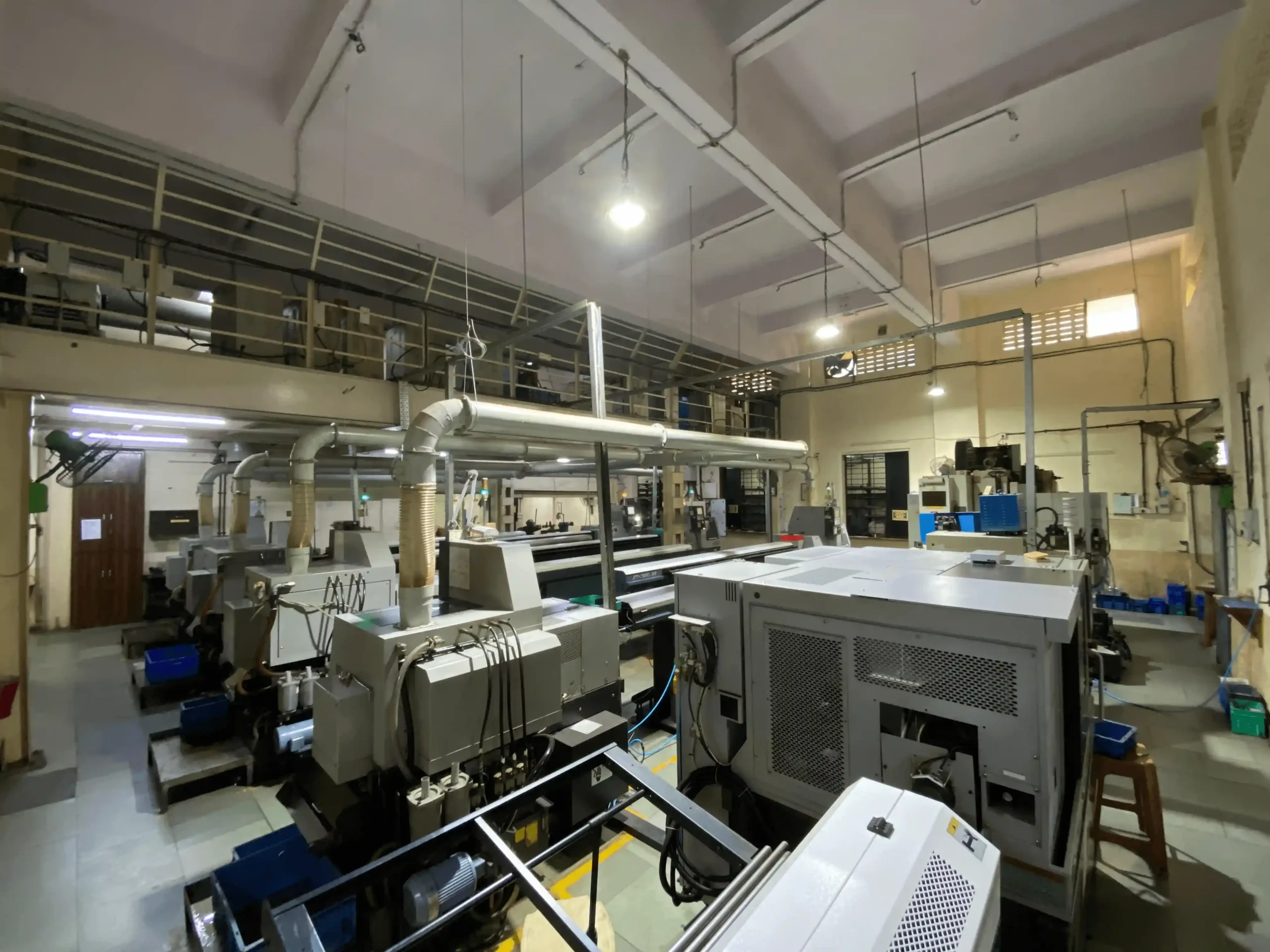 CNC sliding head shop floor with bar feeders – OM BSA Enterprises